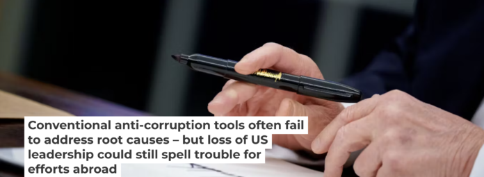 President Donald Trump signs a series of executive orders on Feb. 10, 2025, including an order relating to the Foreign Corrupt Practices Act. Andrew Harnik/Getty Images